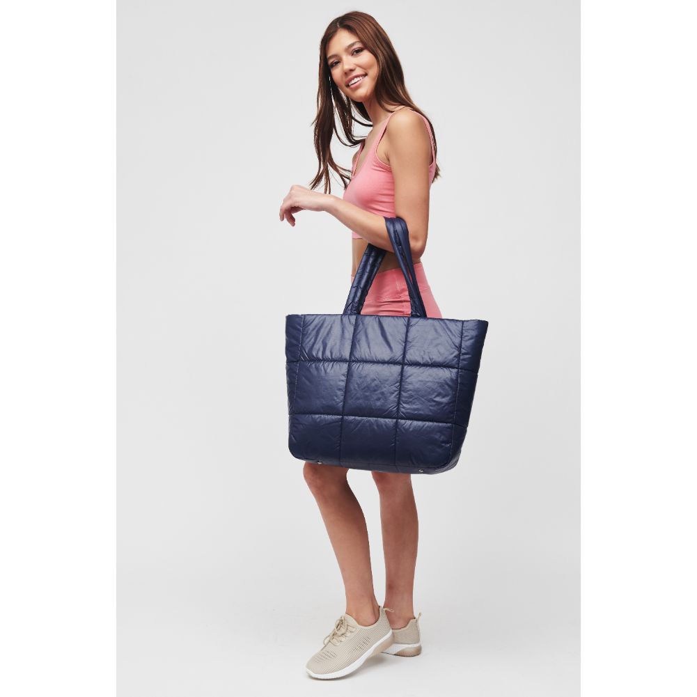 Woman wearing Midnight Urban Expressions Neeva Tote 818209010412 View 4 | Midnight