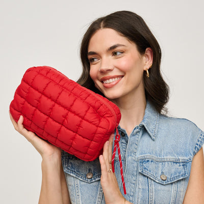 Woman wearing Red Urban Expressions Cloud Nine - Quilted Puffer Nylon Cosmetic Pouch 840611143815 View 1 | Red