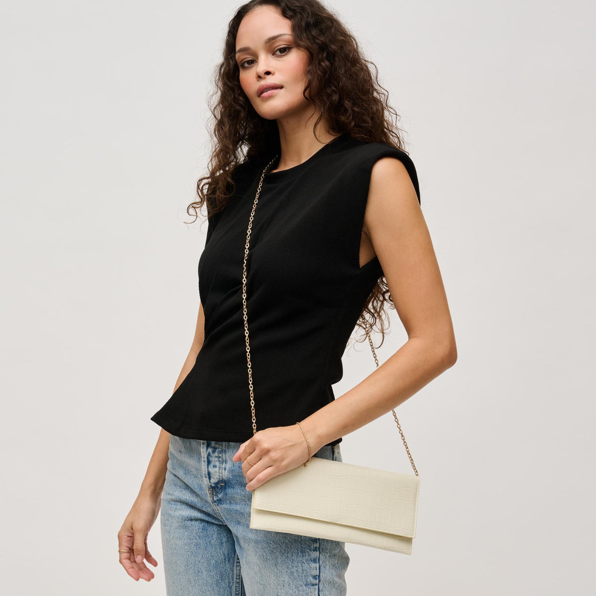 Woman wearing Ivory Urban Expressions Adelle Clutch 840611139658 View 3 | Ivory