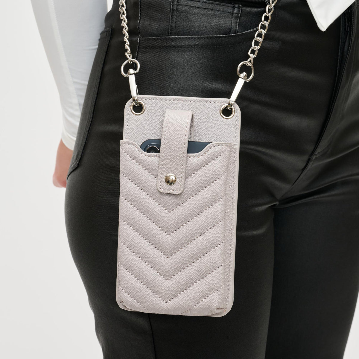 Woman wearing Dove Grey Urban Expressions Claire - Chevron Stitch Cell Phone Crossbody 840611190642 View 4 | Dove Grey