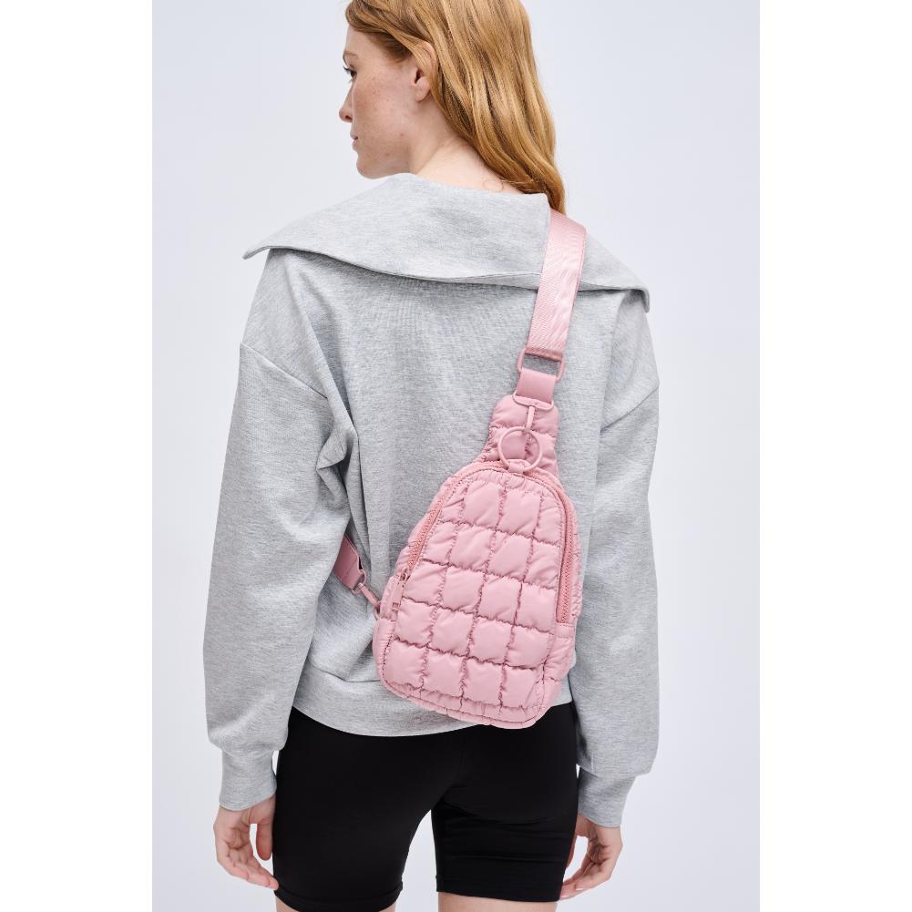 Woman wearing Rose Urban Expressions Bristol Sling Backpack 840611128355 View 2 | Rose