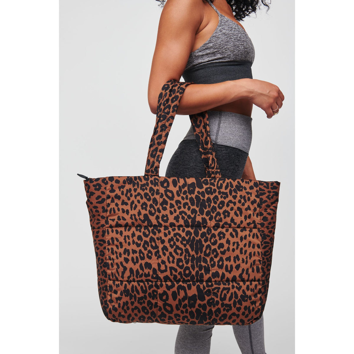 Woman wearing Leopard Urban Expressions Neeva Tote 818209010429 View 1 | Leopard