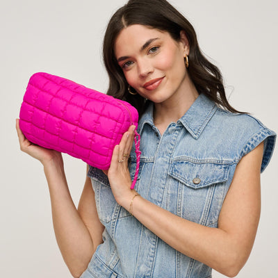 Woman wearing Fuchsia Urban Expressions Cloud Nine - Quilted Puffer Nylon Cosmetic Pouch 840611143778 View 1 | Fuchsia