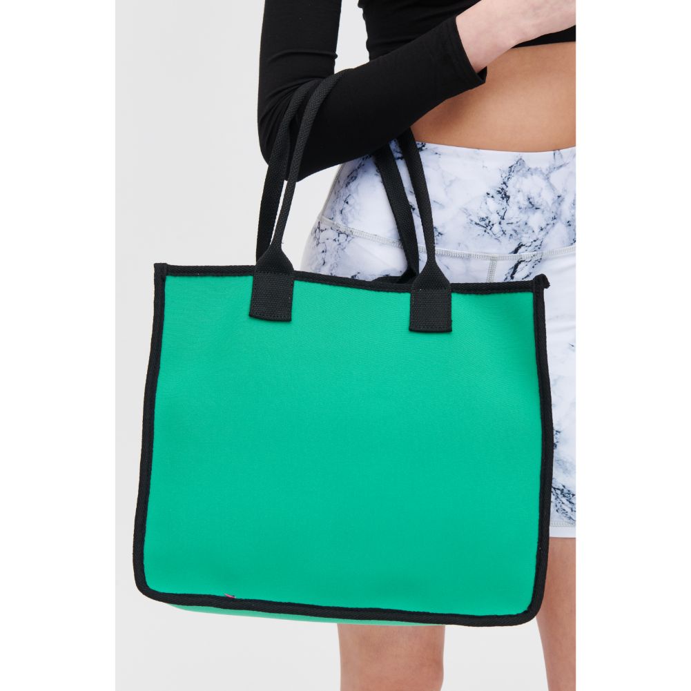 Woman wearing Green Black Urban Expressions Wade Tote 840611118158 View 1 | Green Black