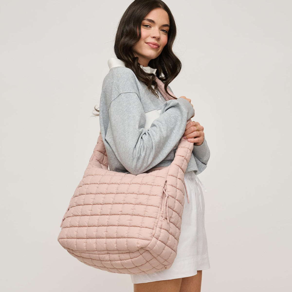 Woman wearing Rose Urban Expressions Leda Hobo 840611142733 View 2 | Rose