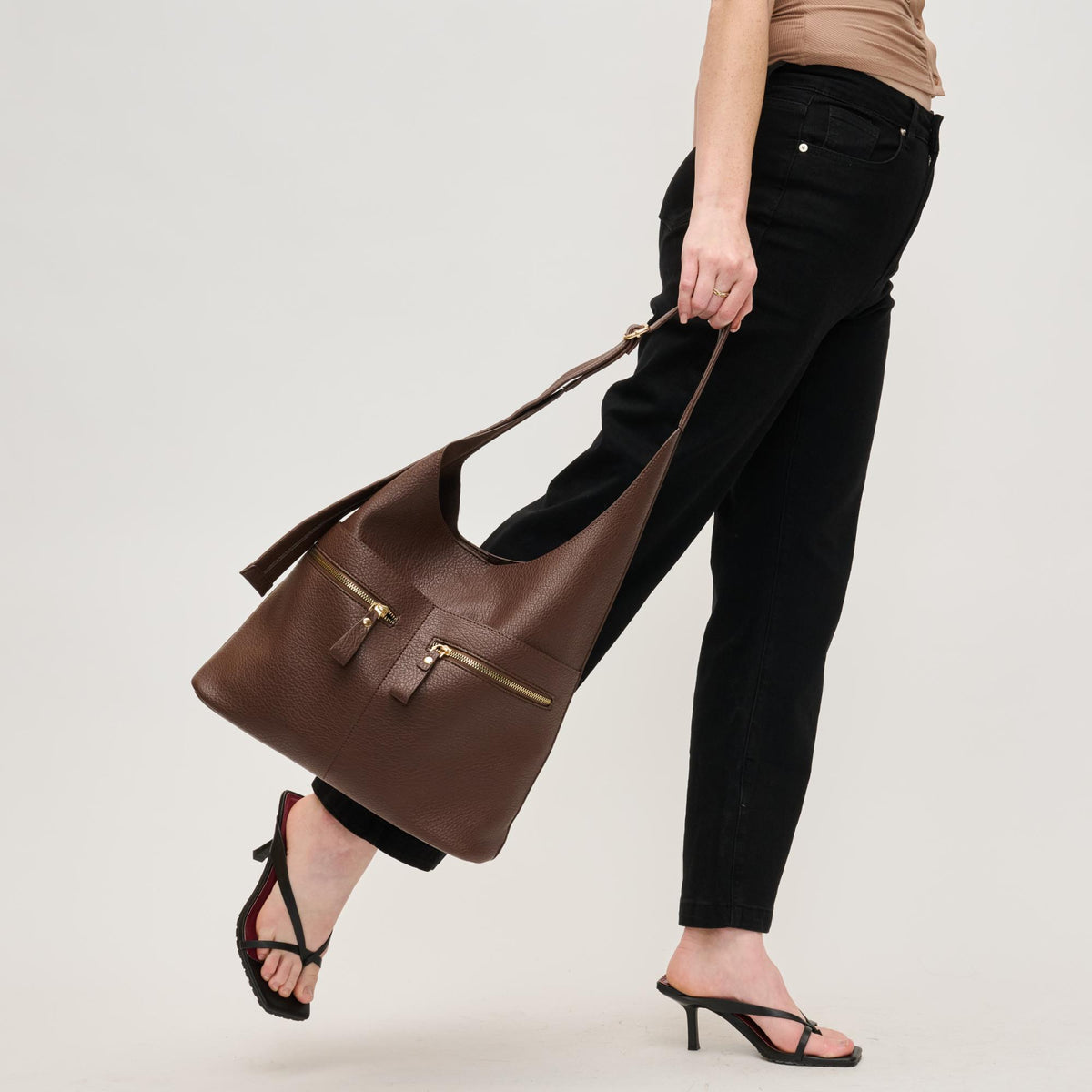 Woman wearing Chocolate Urban Expressions Rhea Hobo 840611145246 View 4 | Chocolate