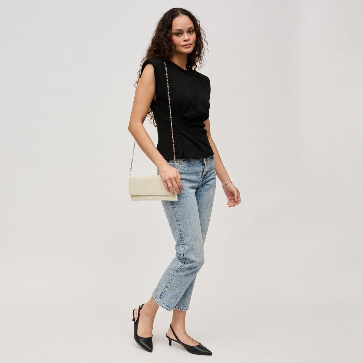 Woman wearing Ivory Urban Expressions Adelle Clutch 840611139658 View 4 | Ivory