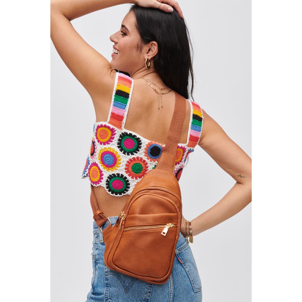 Woman wearing Cognac Urban Expressions Zephyr Sling Backpack 840611106896 View 1 | Cognac