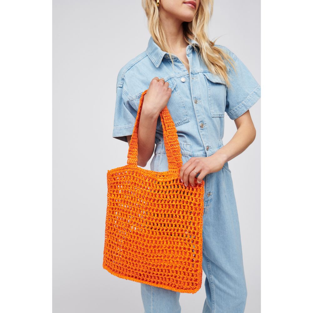 Woman wearing Tangerine Urban Expressions Bouvet Tote 818209016995 View 2 | Tangerine