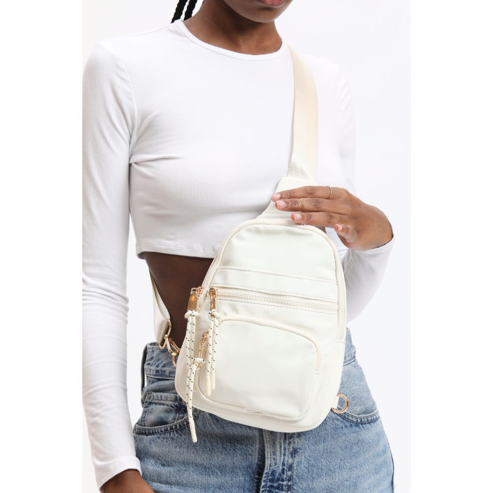 Woman wearing Ivory Urban Expressions Sid Sling Backpack 840611120700 View 1 | Ivory