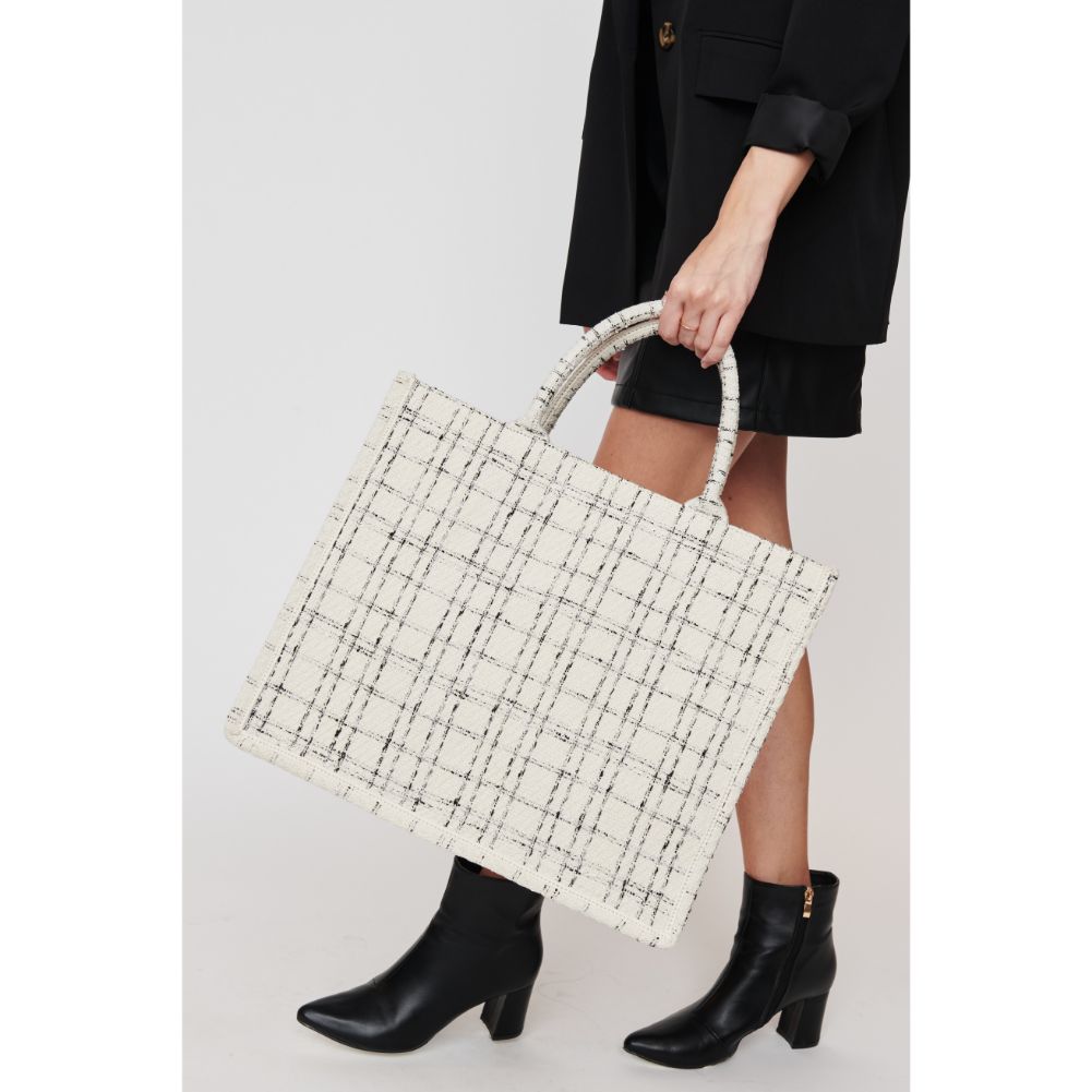 Woman wearing White Black Urban Expressions Iona Tote 840611102423 View 2 | White Black