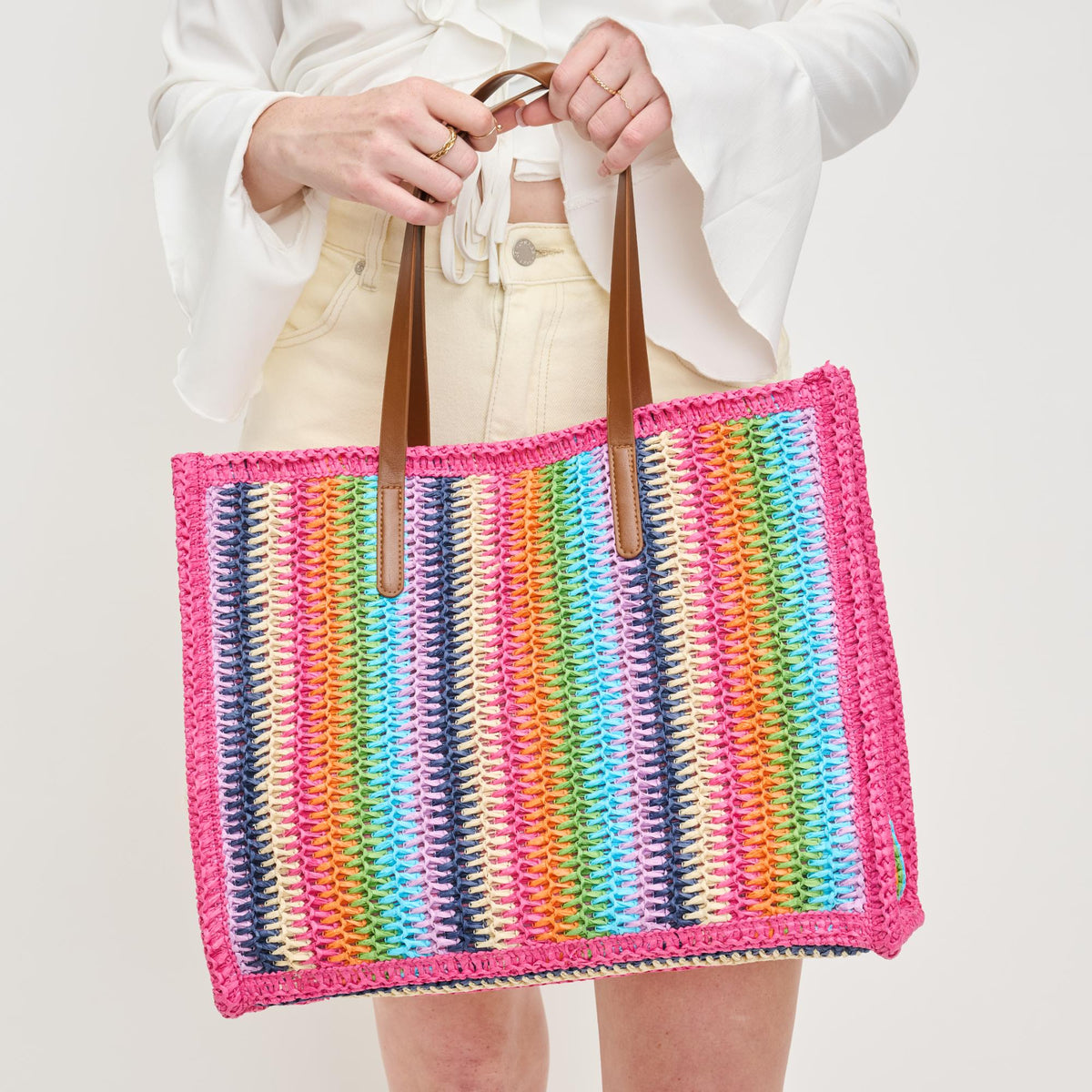 Woman wearing Pink Multi Urban Expressions Candi Tote 840611132529 View 1 | Pink Multi