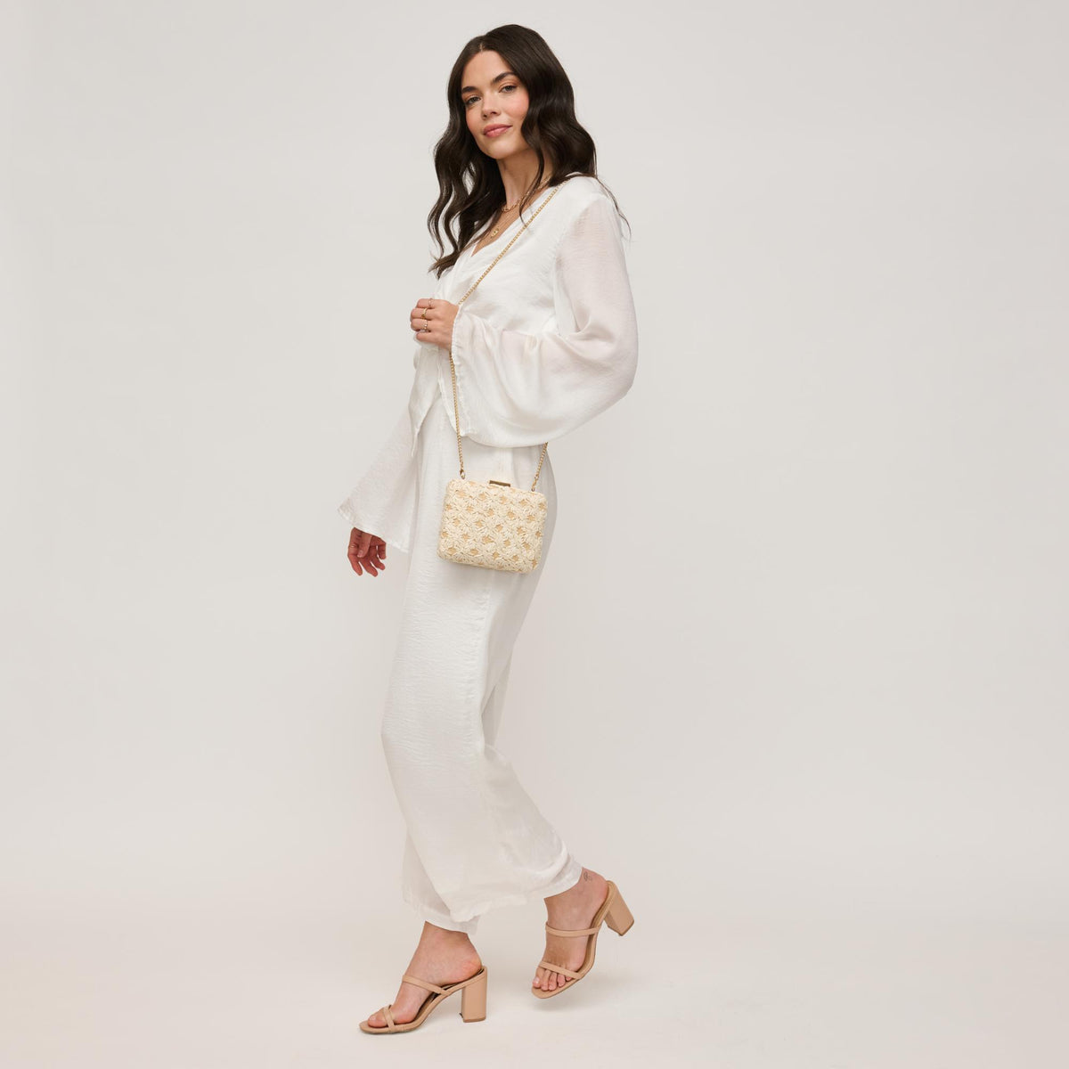 Woman wearing Ivory Natural Urban Expressions Samantha Evening Bag 840611149343 View 4 | Ivory Natural