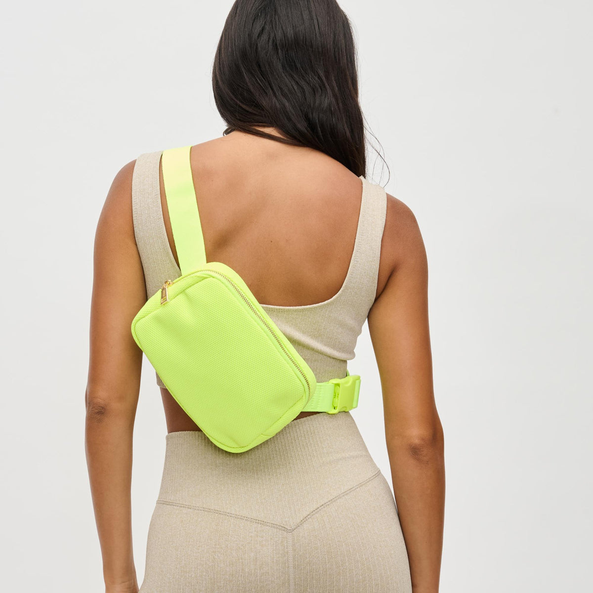 Woman wearing Neon Yellow Urban Expressions Felix Belt Bag 840611122704 View 2 | Neon Yellow