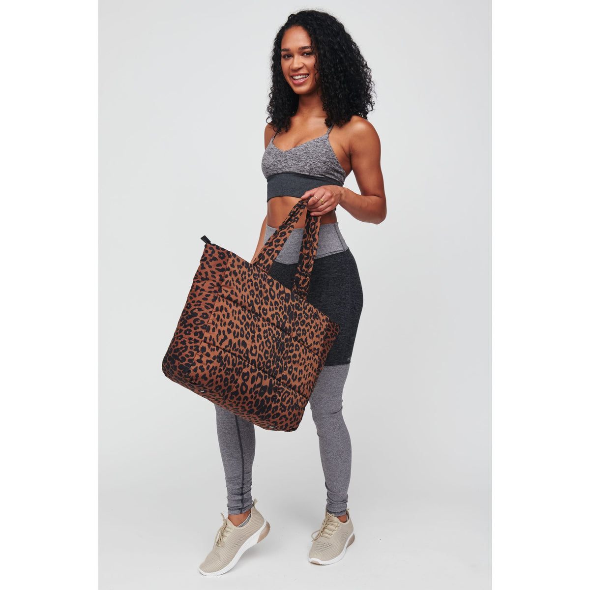 Woman wearing Leopard Urban Expressions Neeva Tote 818209010429 View 4 | Leopard