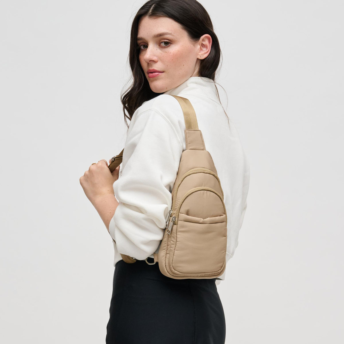 Woman wearing Natural Urban Expressions Kenny Sling Backpack 840611124975 View 2 | Natural