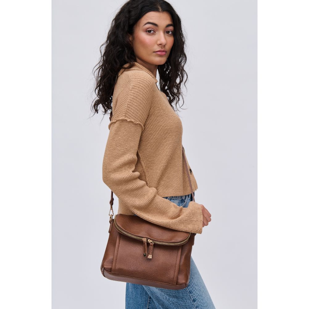 Woman wearing Chocolate Urban Expressions Iris Crossbody 840611116031 View 2 | Chocolate