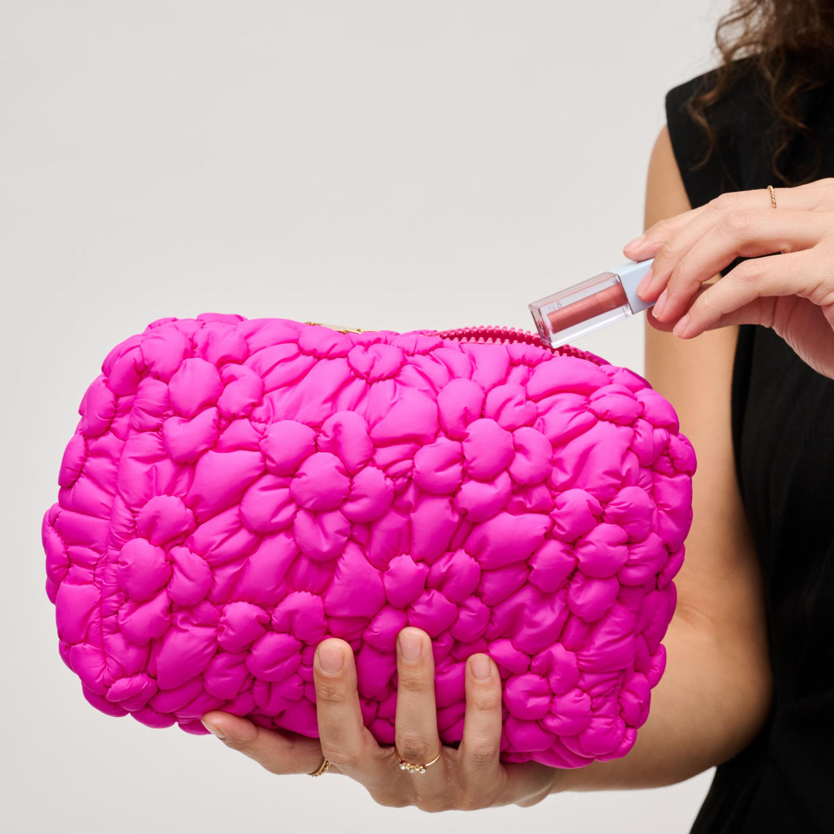 Woman wearing Fuchsia Urban Expressions Flora Pop - Nylon Cosmetic Pouch 840611144195 View 1 | Fuchsia