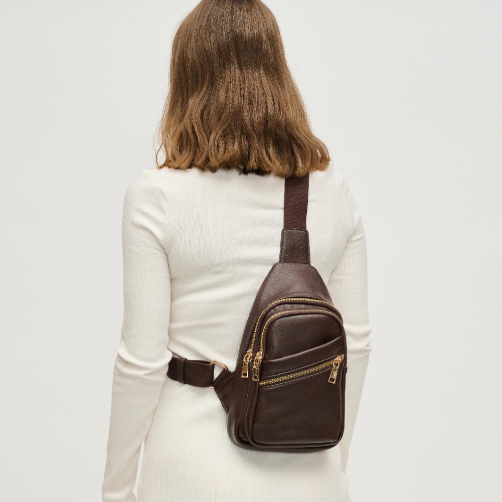 Woman wearing Espresso Urban Expressions Zephyr Sling Backpack 840611193285 View 2 | Espresso