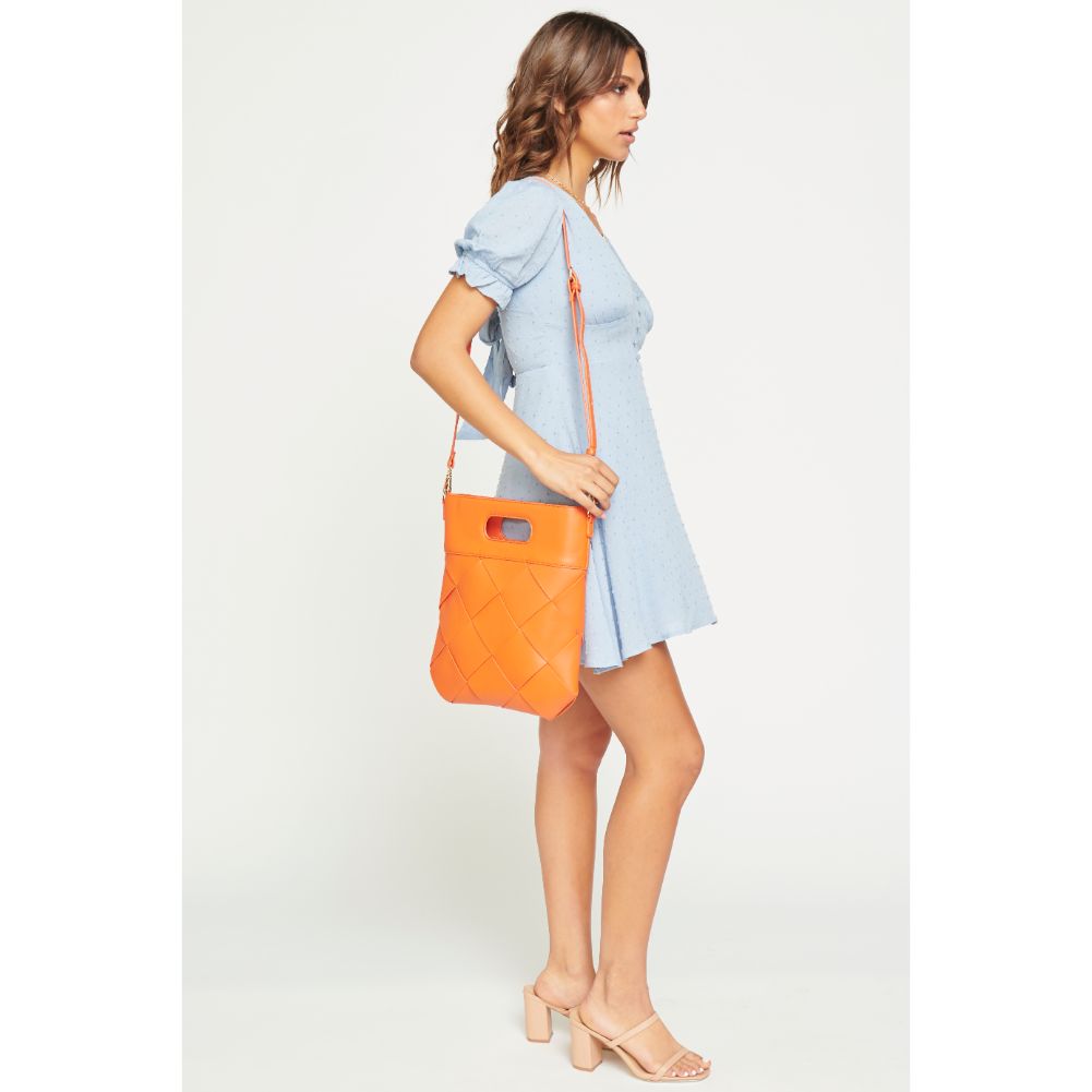 Woman wearing Tangerine Urban Expressions Rosie Crossbody 840611172396 View 1 | Tangerine