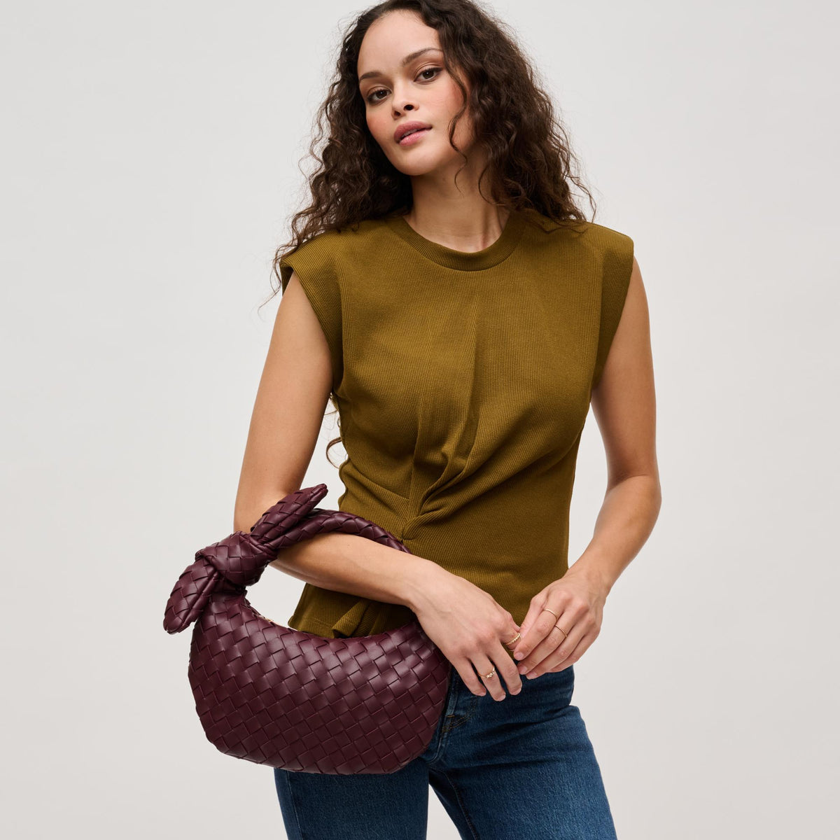 Woman wearing Merlot Urban Expressions Lizbeth Clutch 840611127822 View 2 | Merlot