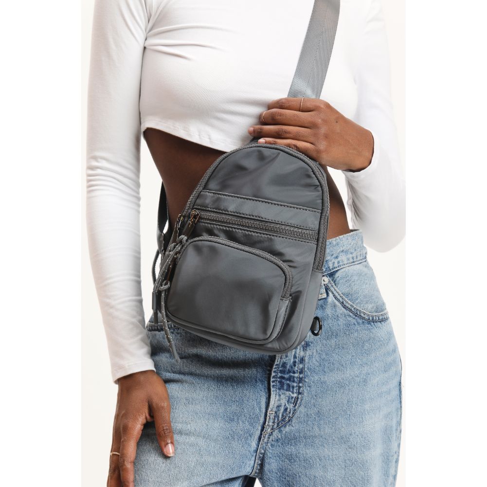 Woman wearing Carbon Urban Expressions Sid Sling Backpack 840611120670 View 4 | Carbon