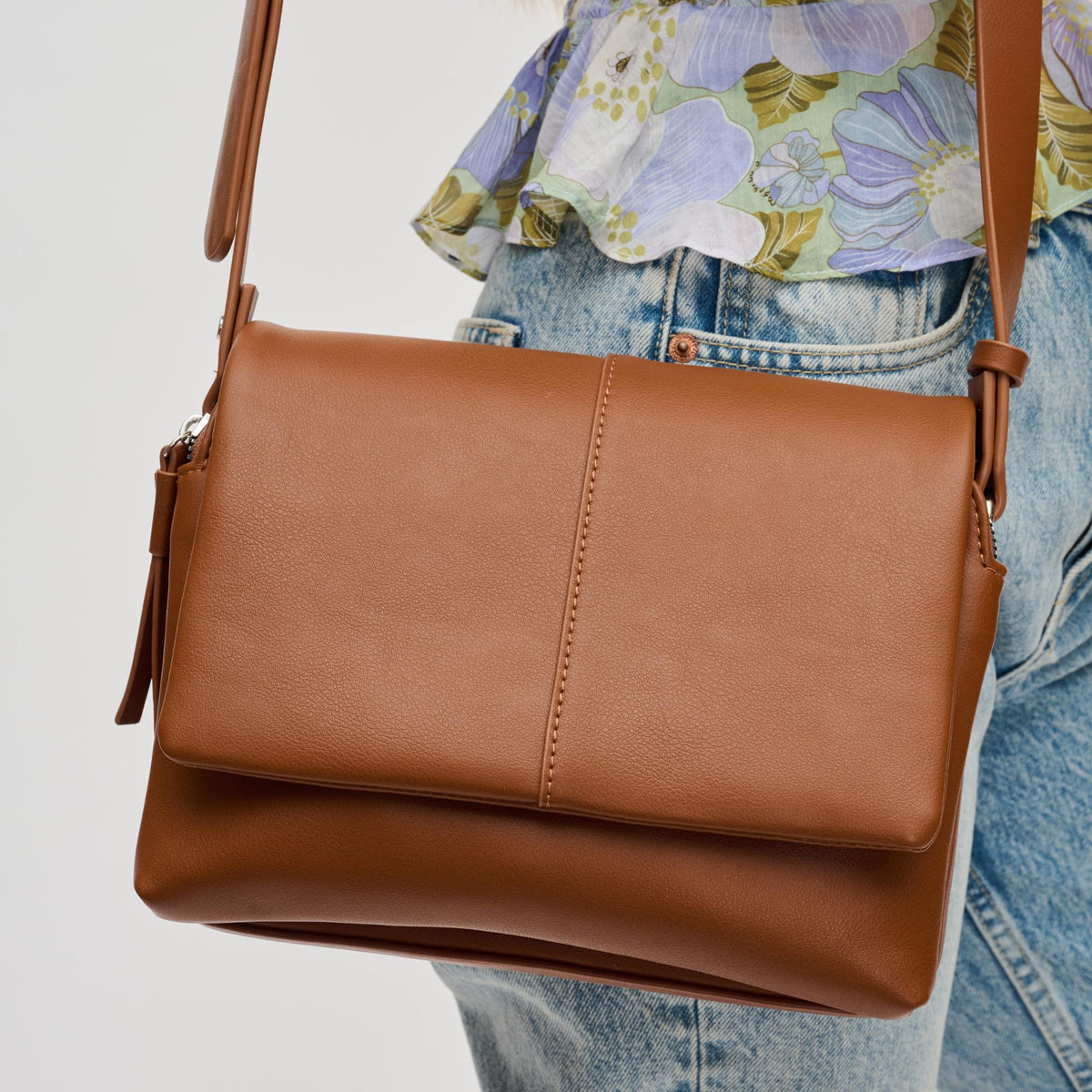 Woman wearing Cognac Urban Expressions Avonlea Crossbody 840611130235 View 4 | Cognac