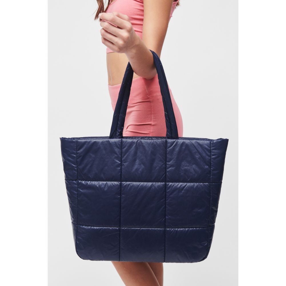 Woman wearing Midnight Urban Expressions Neeva Tote 818209010412 View 1 | Midnight