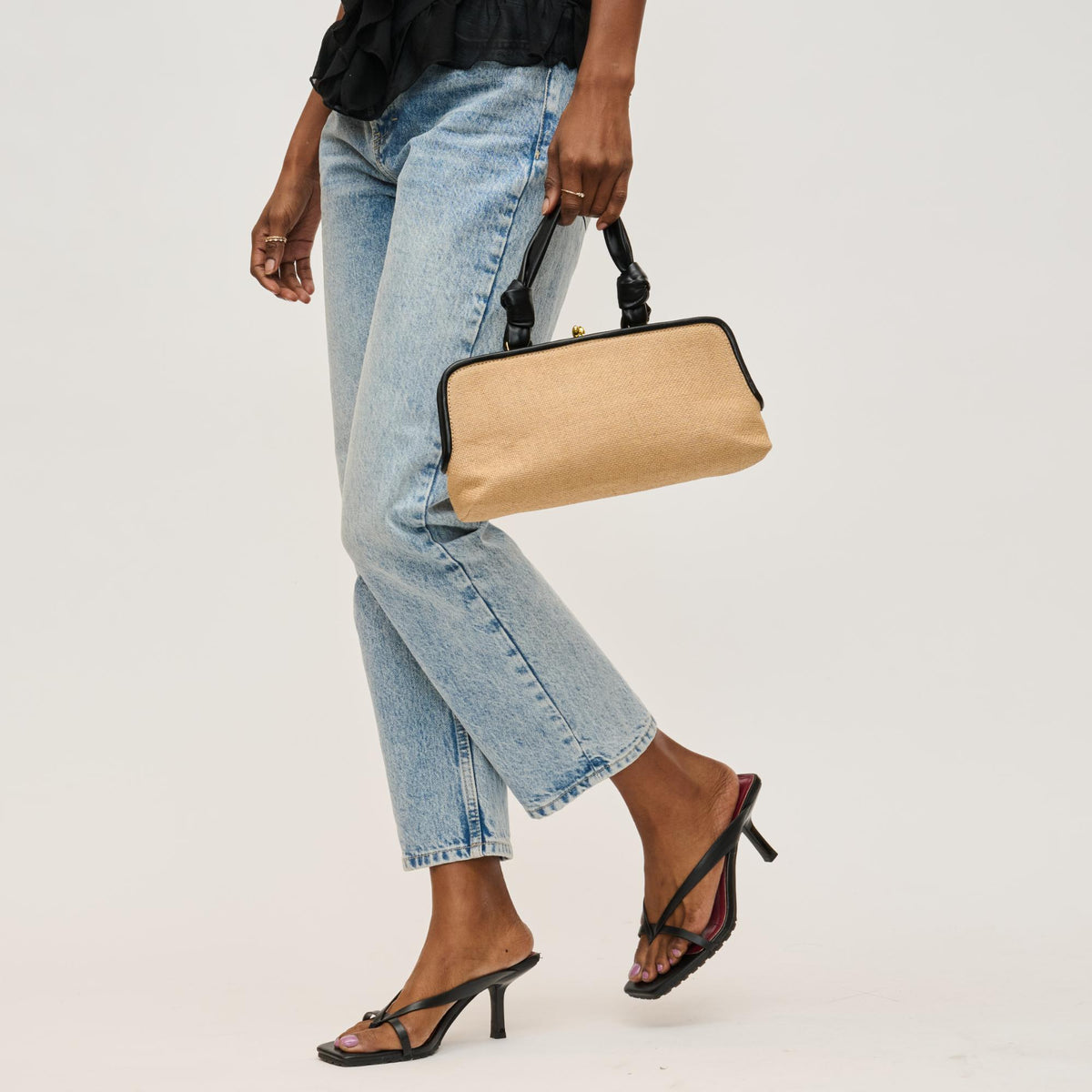 Woman wearing Natural Black Urban Expressions Julissa Clutch 840611158611 View 3 | Natural Black