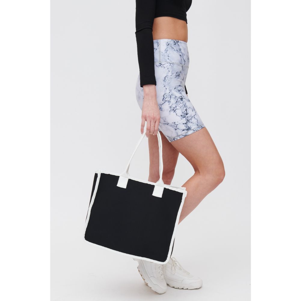 Woman wearing Black White Urban Expressions Wade Tote 840611118141 View 2 | Black White