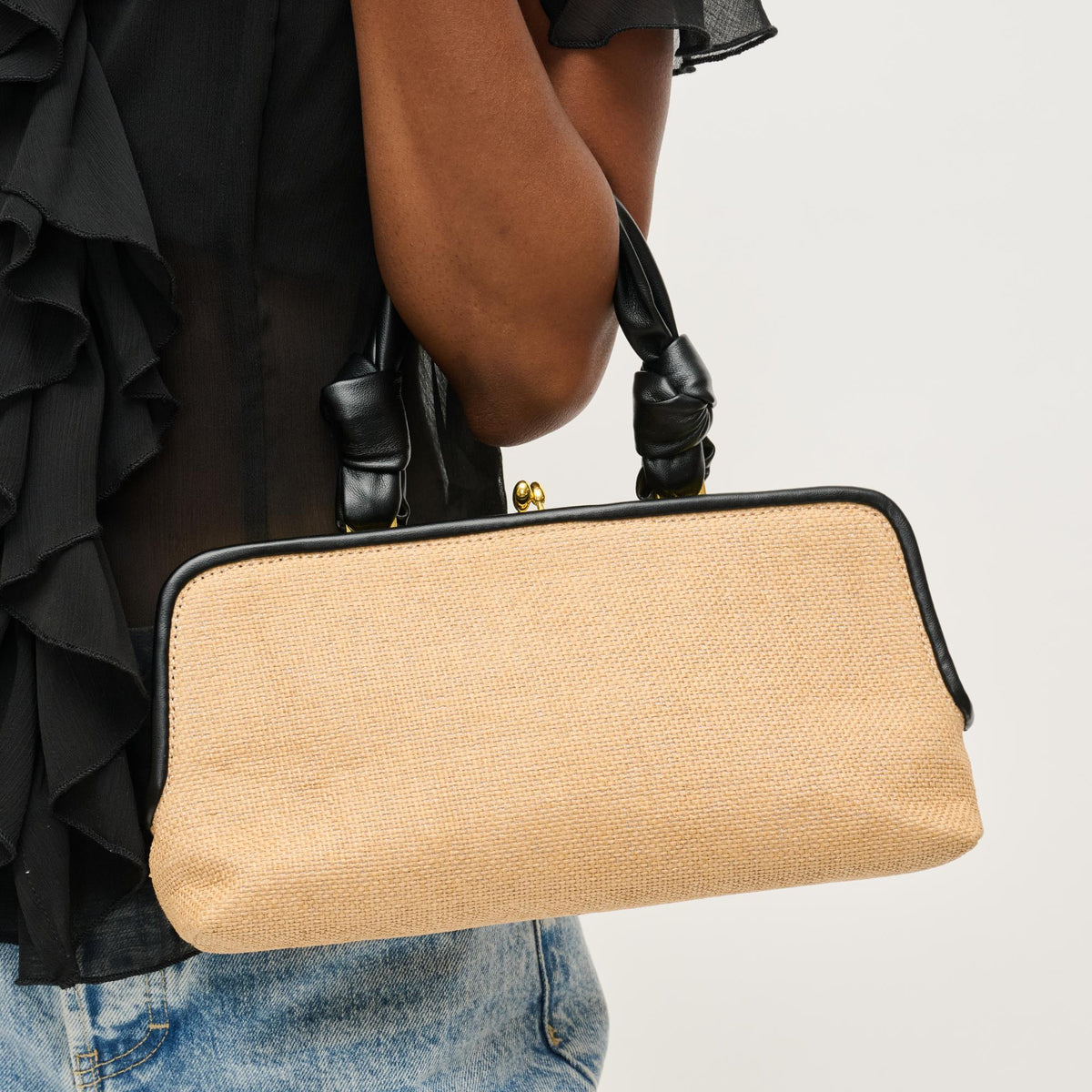 Woman wearing Natural Black Urban Expressions Julissa Clutch 840611158611 View 1 | Natural Black