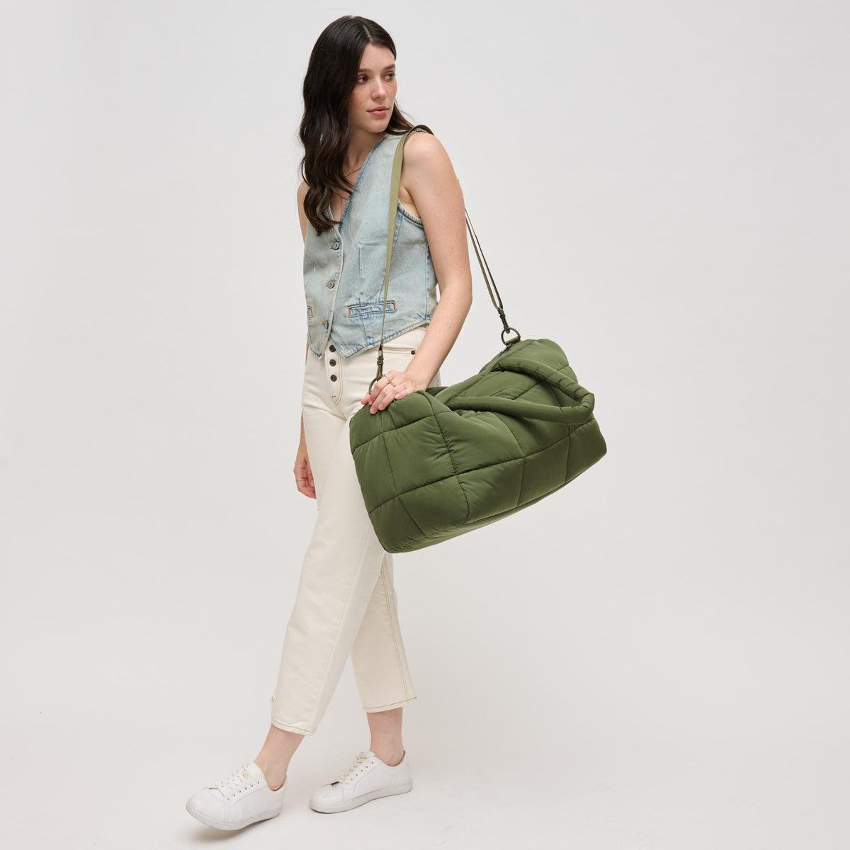 Woman wearing Olive Urban Expressions Freyja Duffel 840611124289 View 4 | Olive