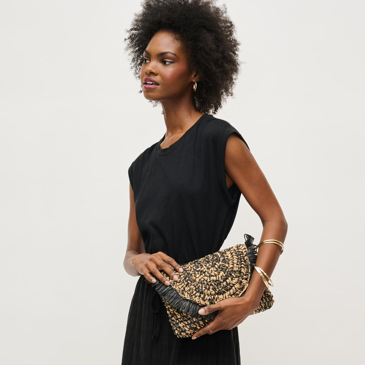 Woman wearing Black Natural Urban Expressions Katia Clutch 840611158550 View 3 | Black Natural