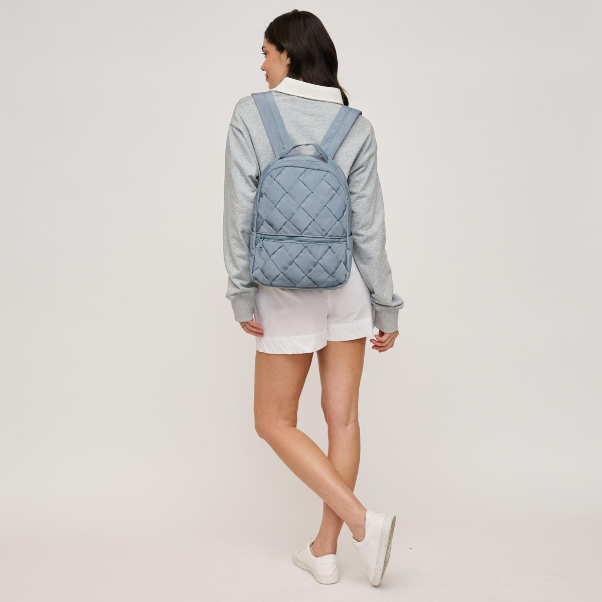 Woman wearing Dusty Blue Urban Expressions Robin Backpack 840611146472 View 3 | Dusty Blue