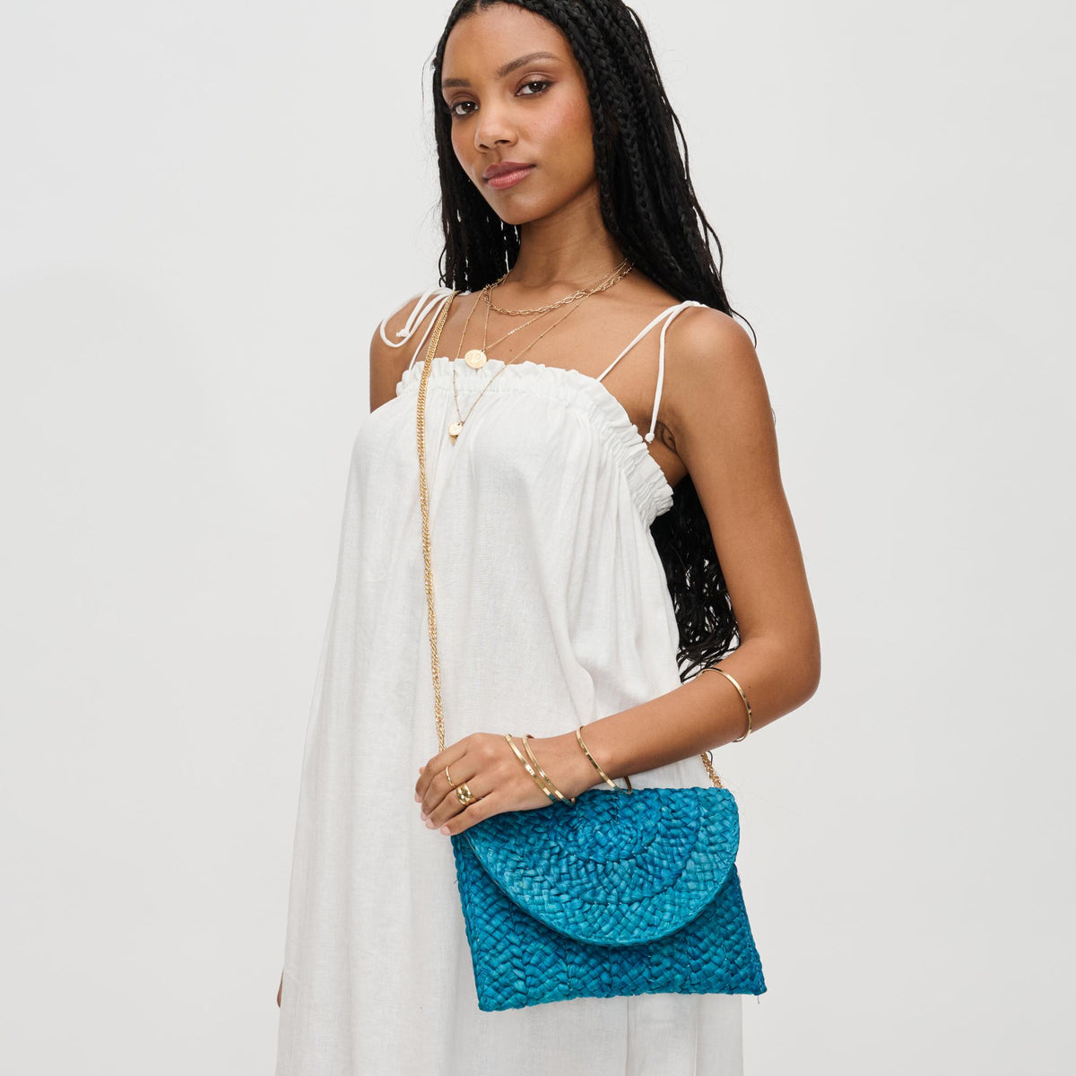 Woman wearing Blue Urban Expressions Aegean Clutch 840611147240 View 1 | Blue