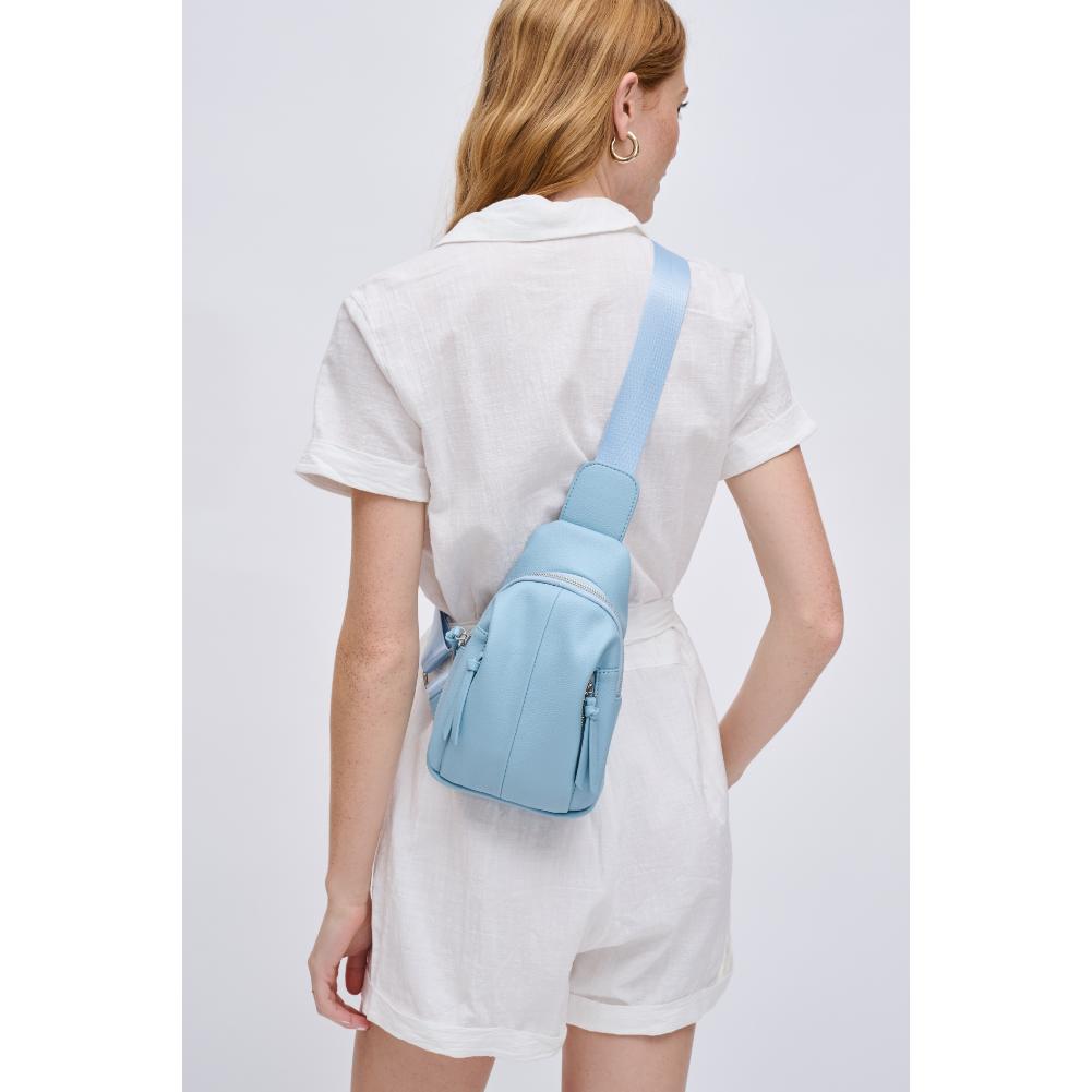 Woman wearing Sky Blue Urban Expressions Emille Sling Backpack 840611191557 View 3 | Sky Blue