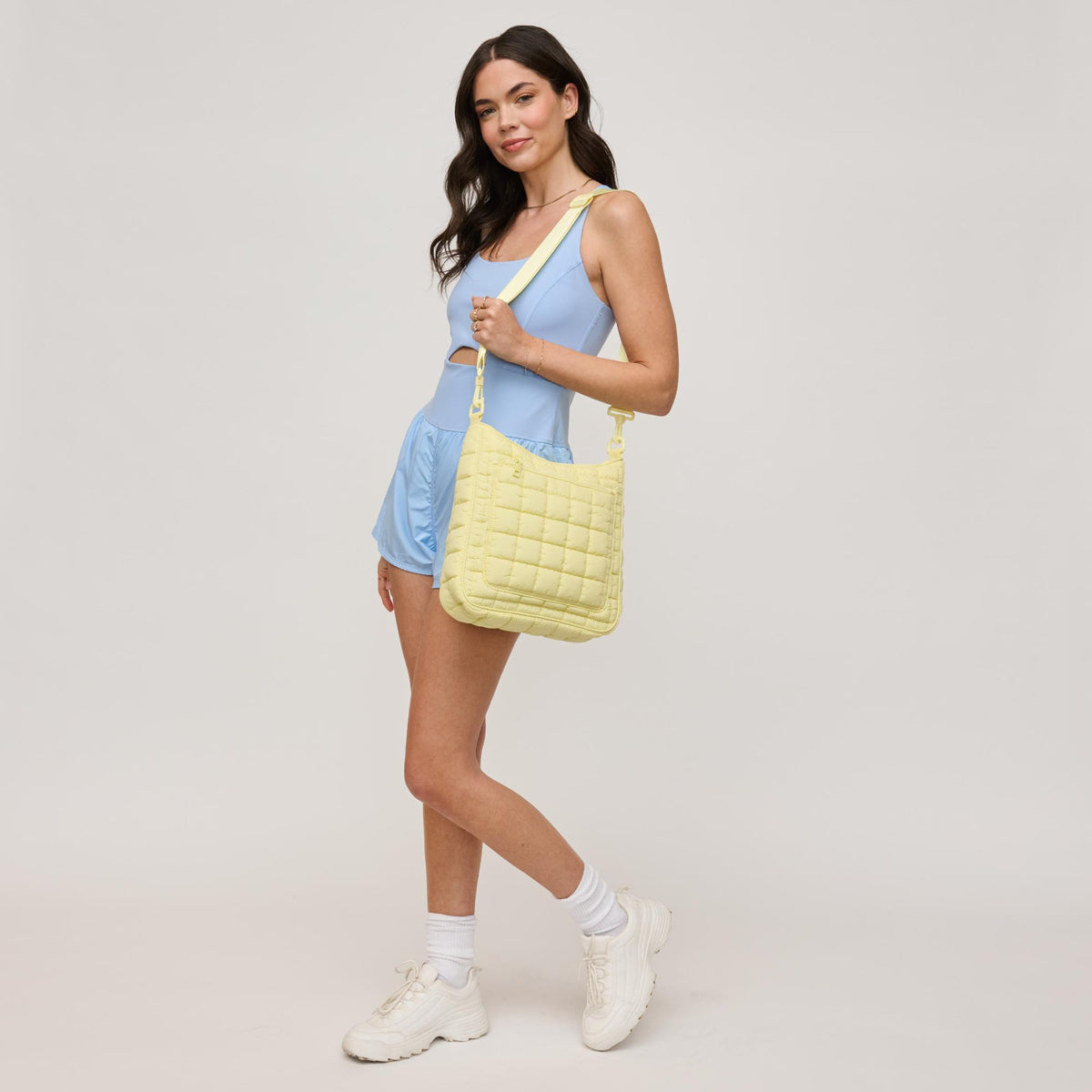 Woman wearing Butter Urban Expressions Fia Crossbody 840611140036 View 3 | Butter