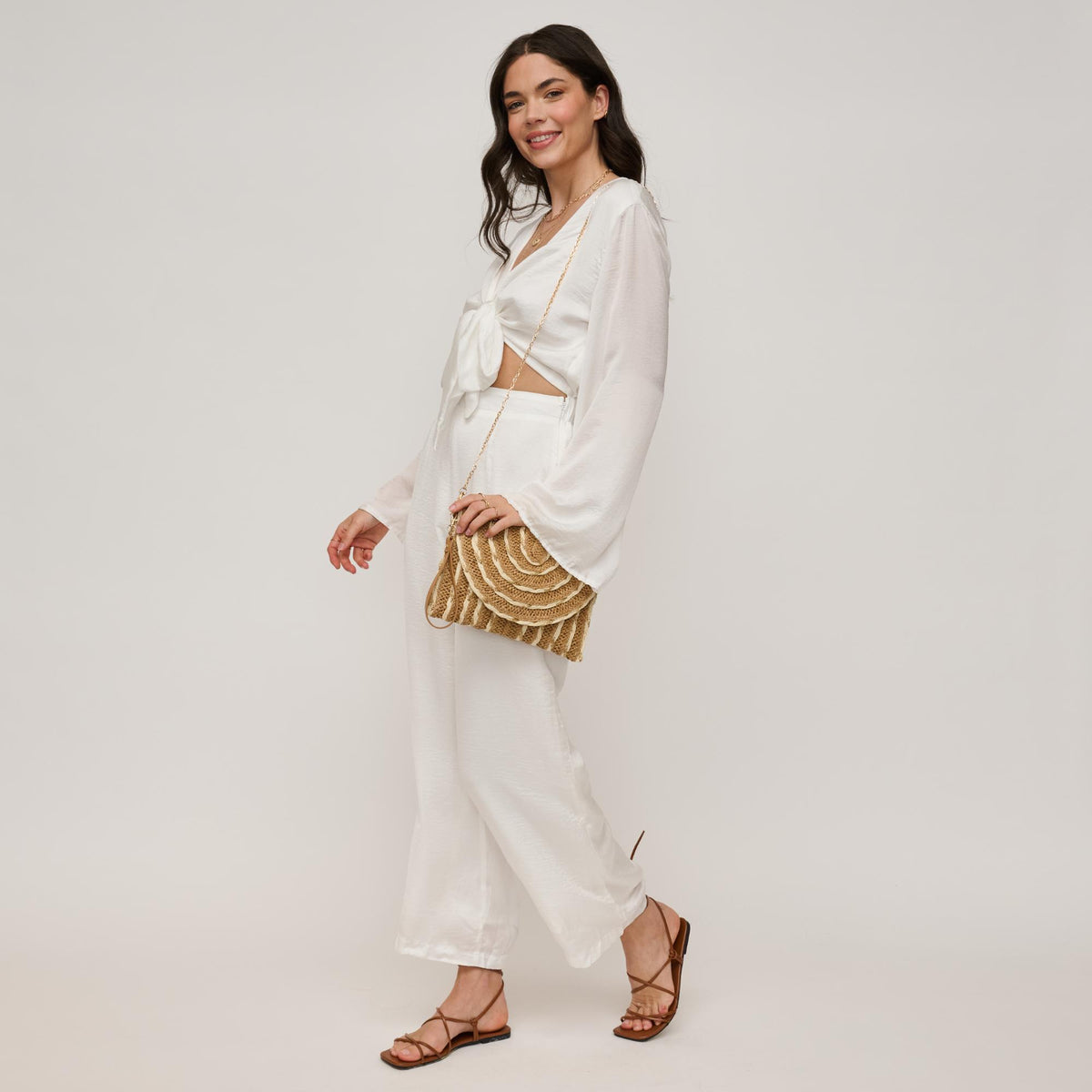 Woman wearing Natural Ivory Gold Urban Expressions Lila Clutch 840611161512 View 4 | Natural Ivory Gold