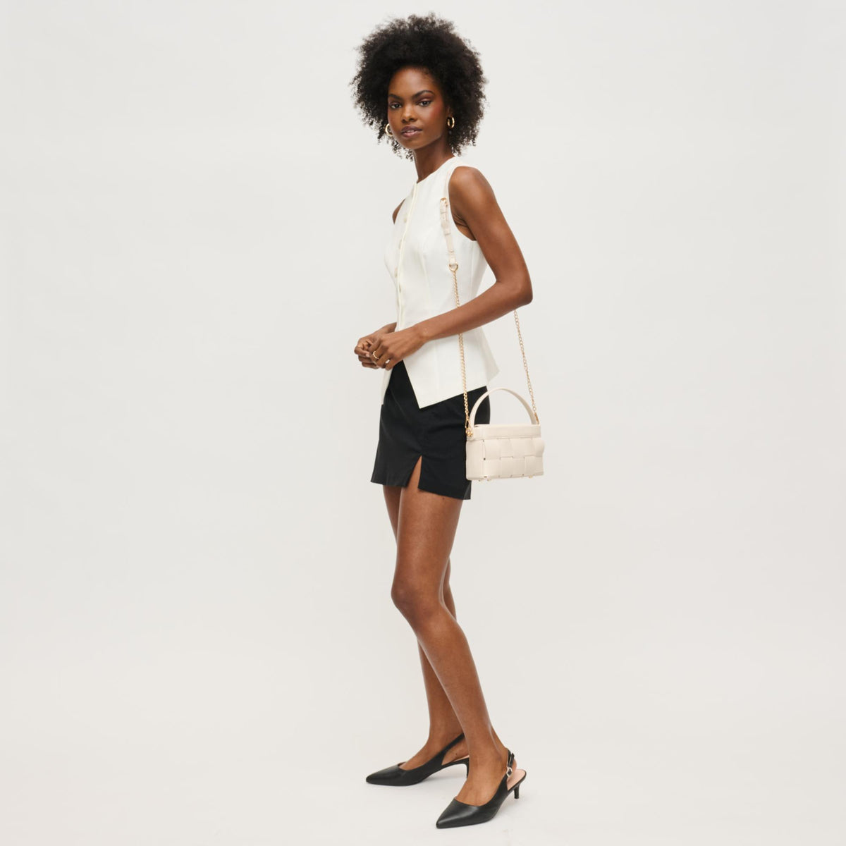 Woman wearing Oatmilk Urban Expressions Aurora Crossbody 840611145345 View 3 | Oatmilk