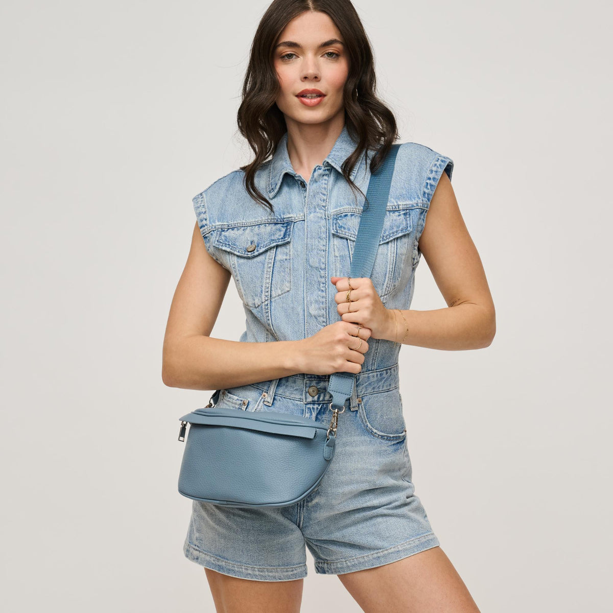 Woman wearing Denim Urban Expressions Laney Belt Bag 840611146502 View 3 | Denim