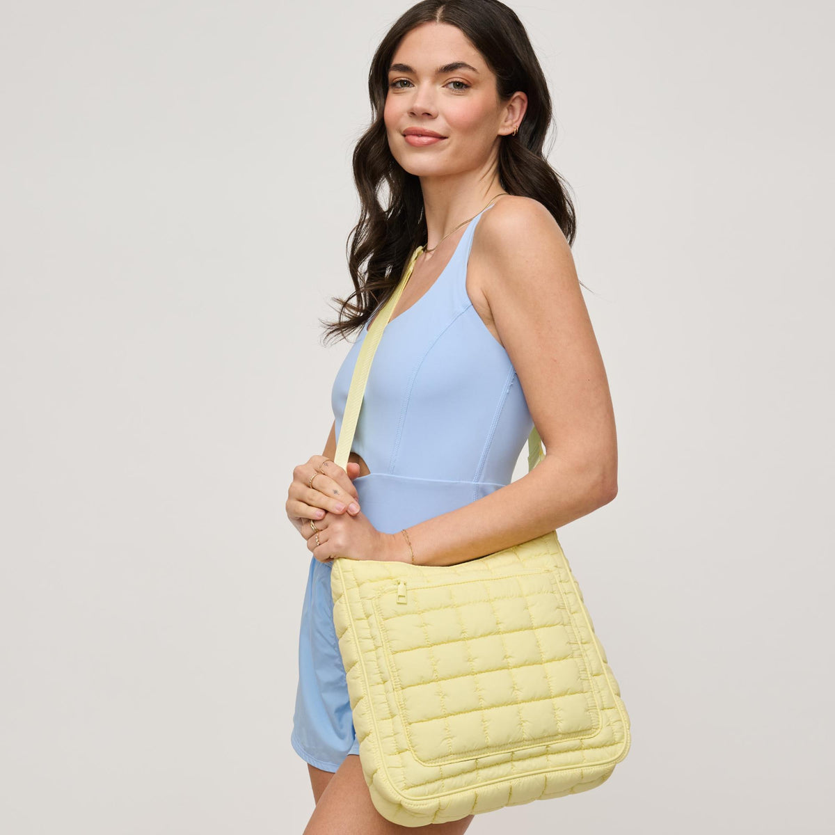 Woman wearing Butter Urban Expressions Fia Crossbody 840611140036 View 1 | Butter