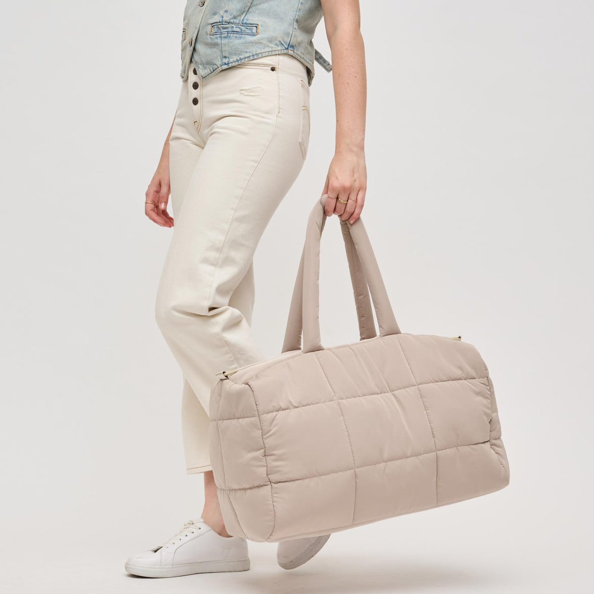 Woman wearing Natural Urban Expressions Freyja Duffel 840611124296 View 2 | Natural