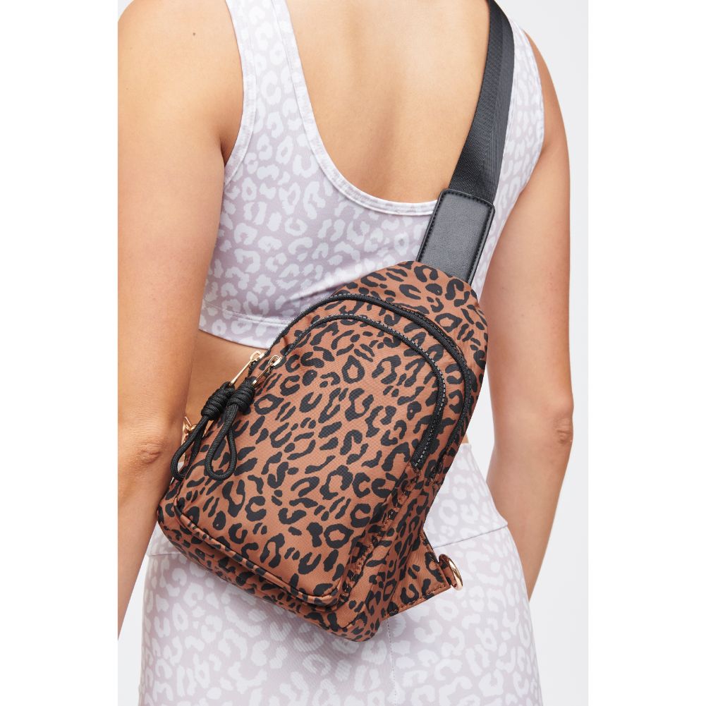 Woman wearing Leopard Urban Expressions Ace Sling Backpack 840611184191 View 3 | Leopard