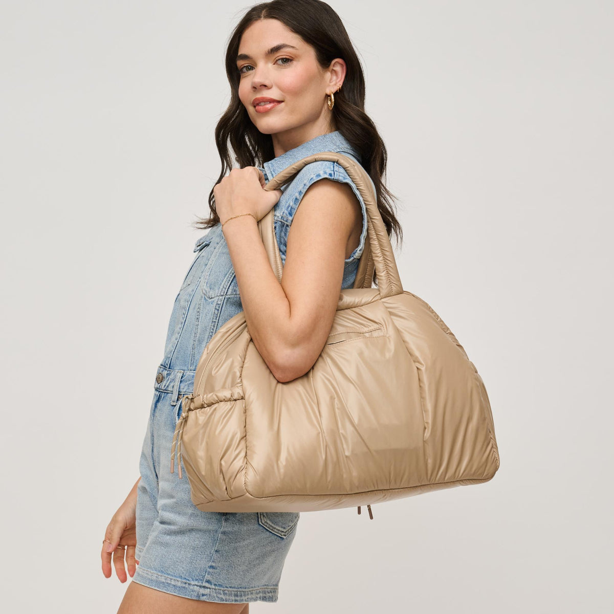 Woman wearing Natural Urban Expressions Rae Duffel 840611140319 View 2 | Natural