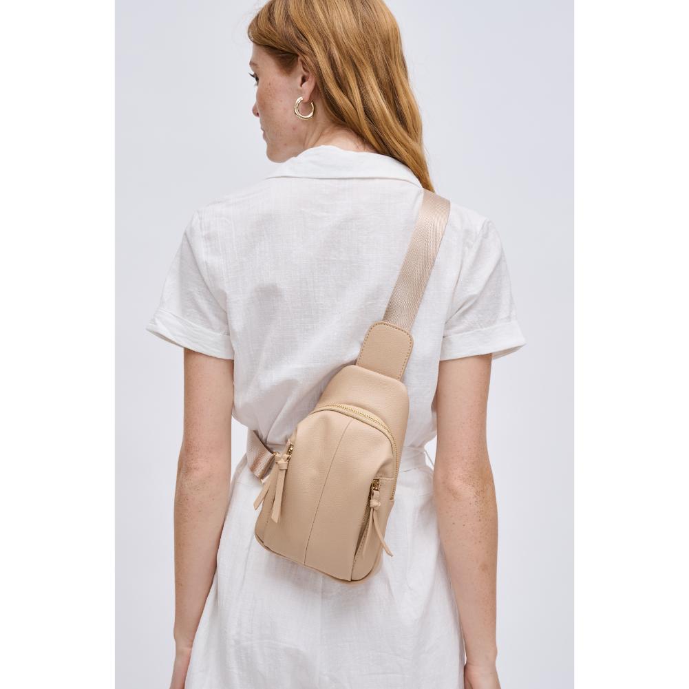 Woman wearing Natural Urban Expressions Emille Sling Backpack 840611191571 View 2 | Natural