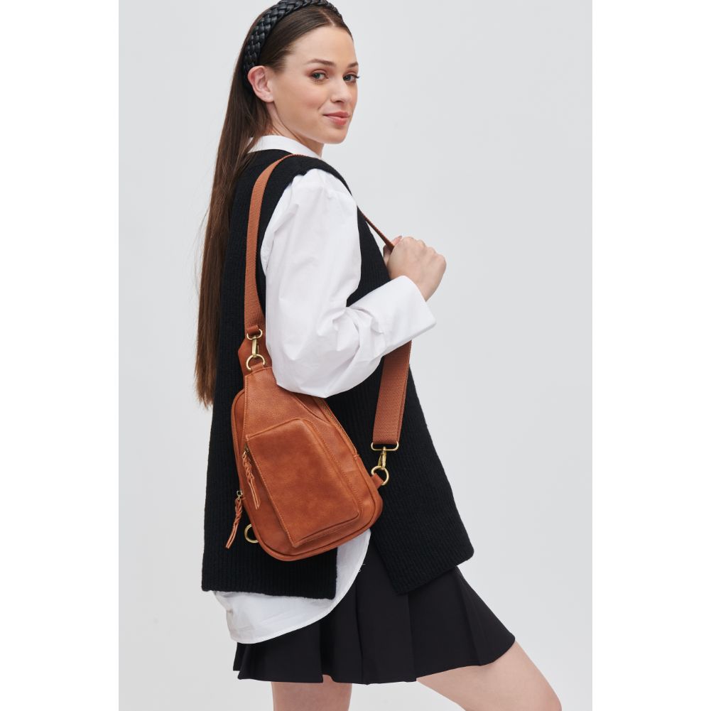 Woman wearing Tan Urban Expressions Wendall Sling Backpack 840611107220 View 1 | Tan