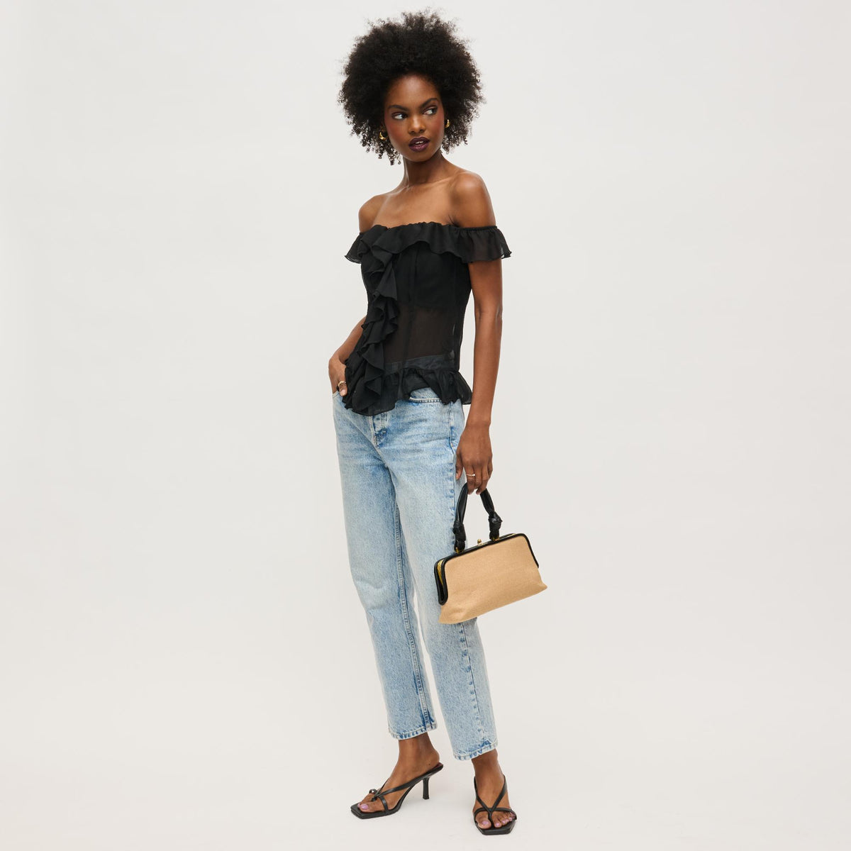 Woman wearing Natural Black Urban Expressions Julissa Clutch 840611158611 View 4 | Natural Black