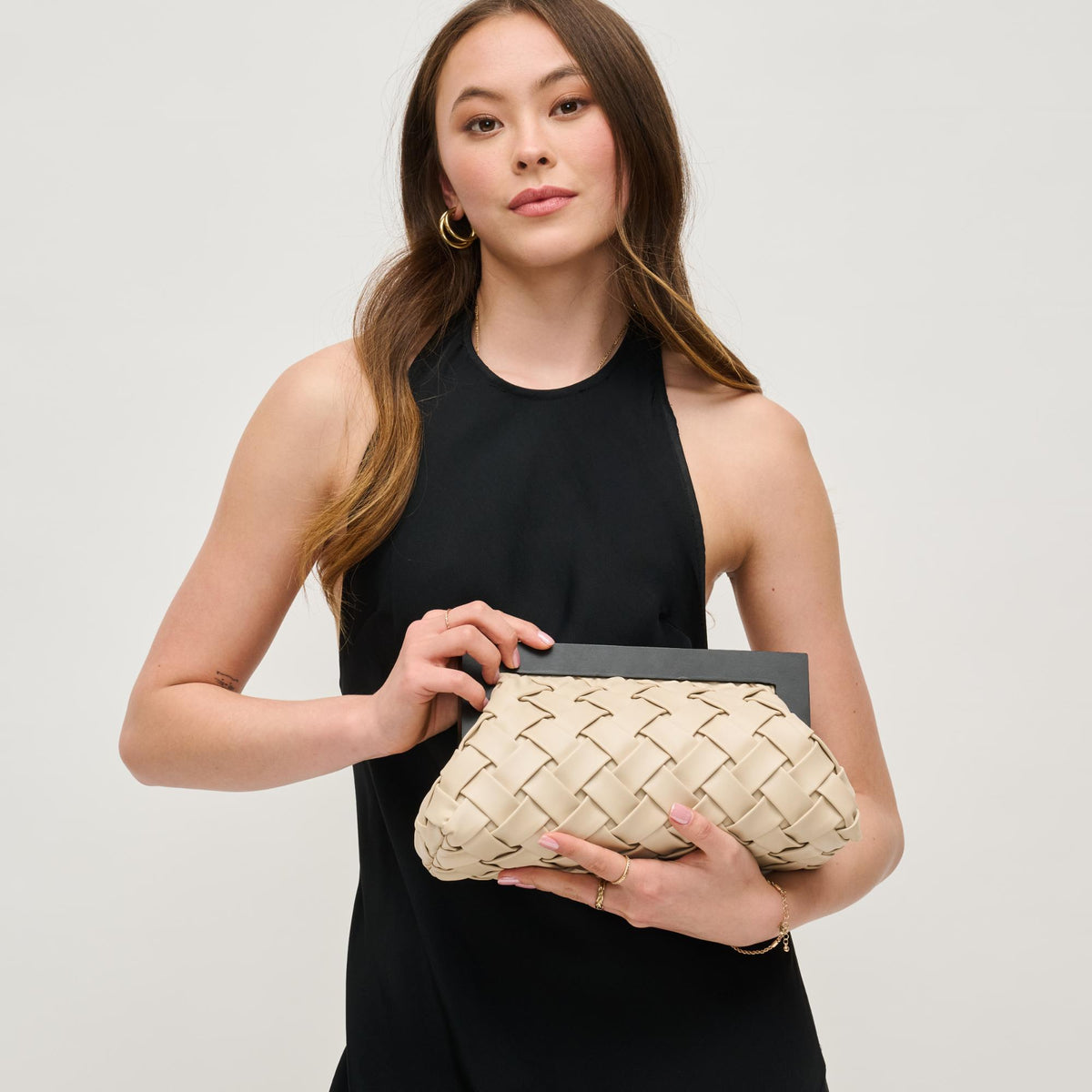 Woman wearing Ivory Urban Expressions Jamie Clutch 840611156921 View 2 | Ivory