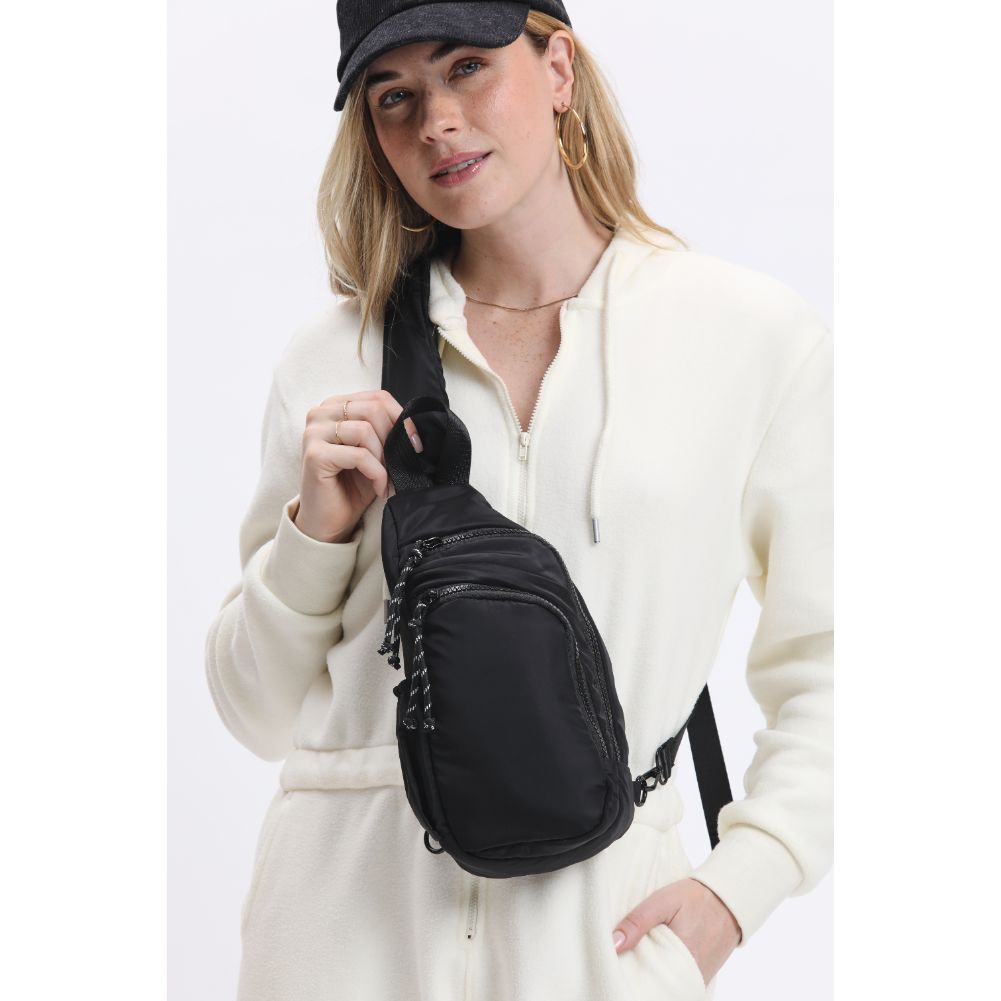 Woman wearing Black Urban Expressions Parc Sling Backpack 840611114419 View 1 | Black