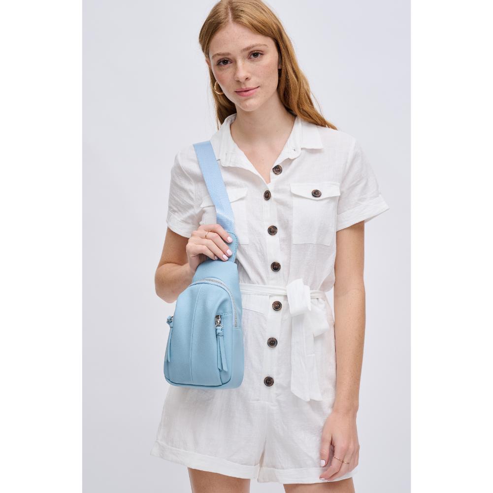 Woman wearing Sky Blue Urban Expressions Emille Sling Backpack 840611191557 View 2 | Sky Blue